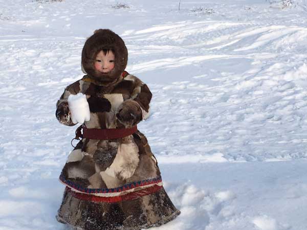 A Nenets child on Siberia’s Yemal Peninsula, the land his parents call “World’s End.” Image: Edward-Adrian-Vallance
