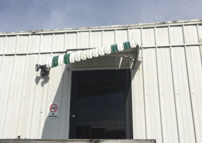 Minor wind damage to an awning at Segrest Farms.