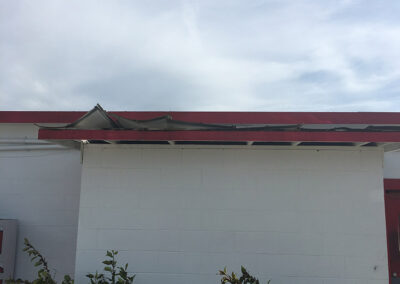 Minor wind damage to a roof at Segrest Farms