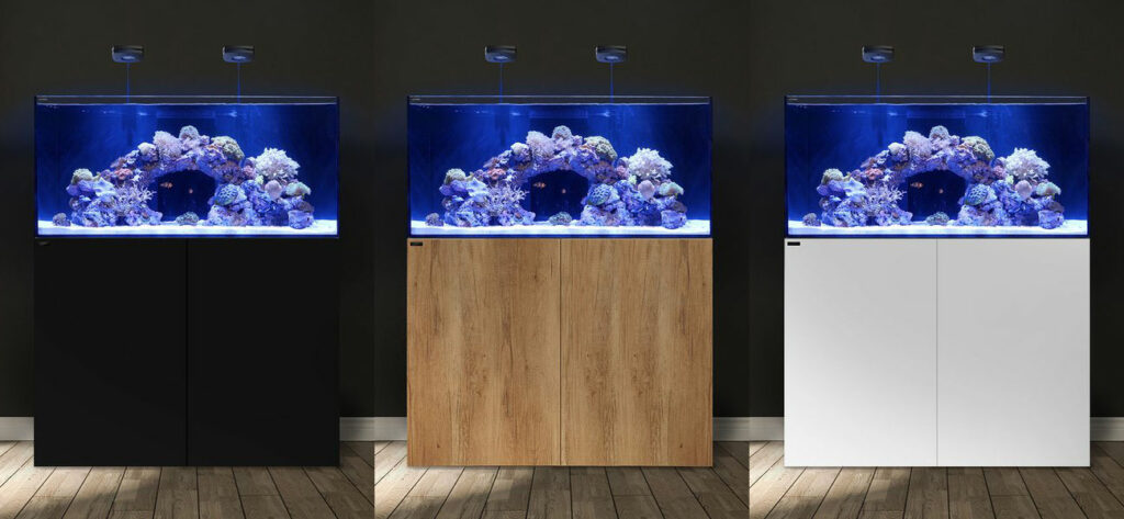 The new MARINE X line of aquariums from Waterbox includes laminated plywood cabinetry available in Black, Oak and White finishes.