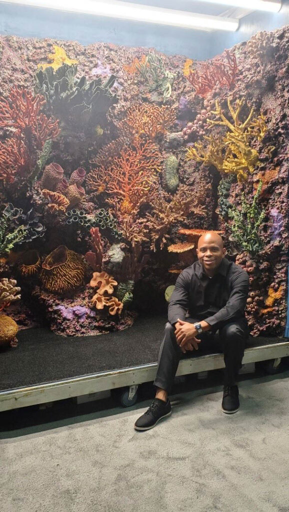TCR president Donte Jarrett shared this photo of himself, sitting in his display, so you could get a better sense of scale!